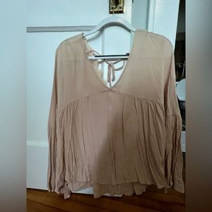 V neck beige top with low, lace lined back by Dress Up.
